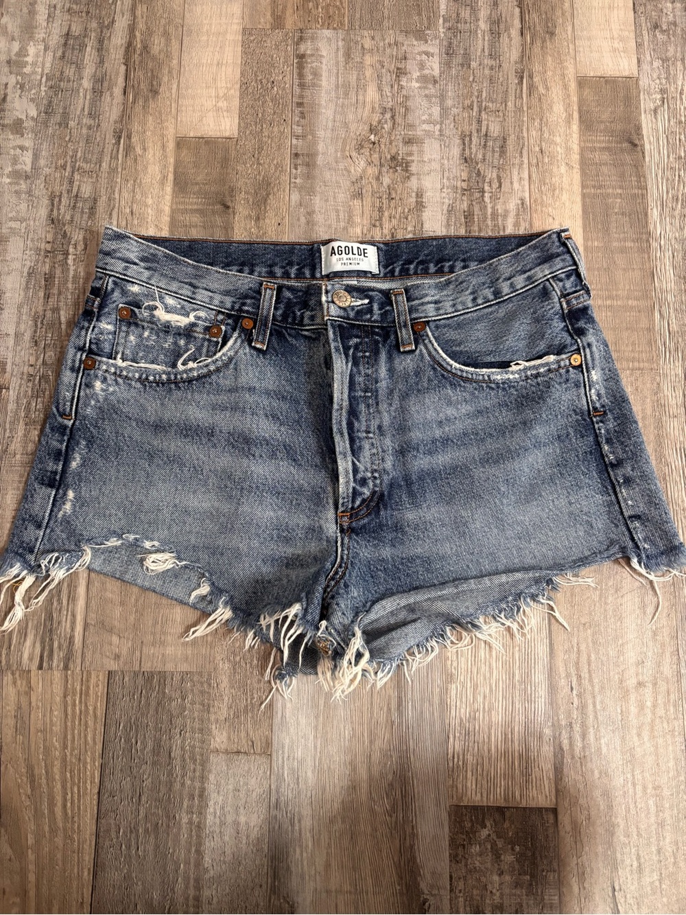 Agolde Distressed Medium Blue Denim Cutoff Shorts